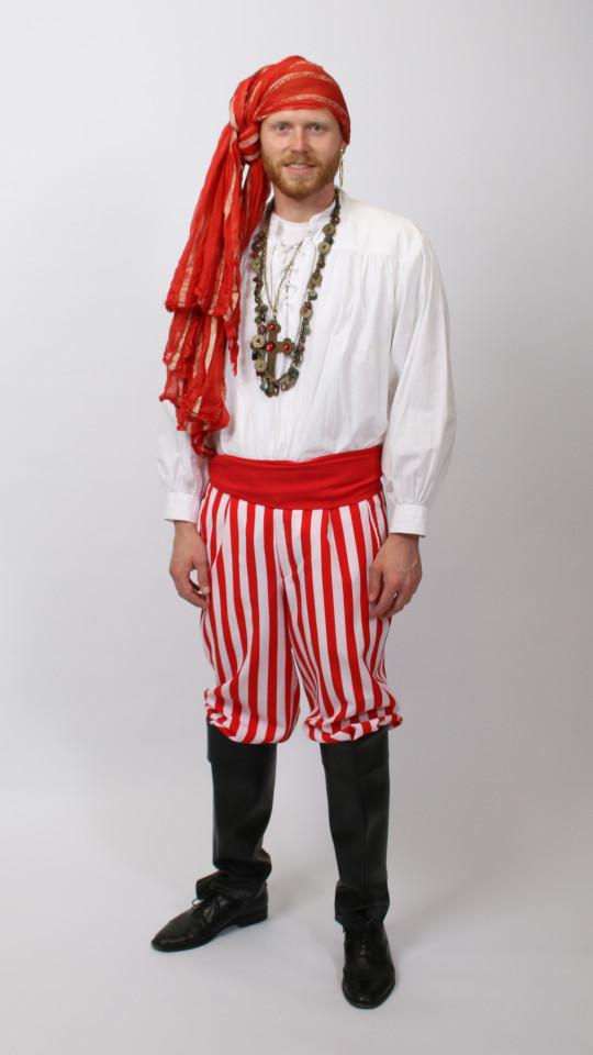 Pirat – Herr der Meere Outfit (Hose, Hemd, Gamaschen, Schärpe, Tuch und 2 Ketten) mieten
