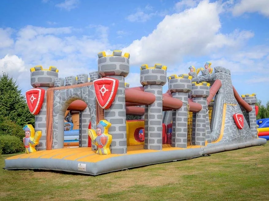 Hindernisparcour - XXL Hüpfburg- Hindernisanlage mit Kletterwand und Rutsche 10x3/17x4m- vielfältige Motivauswahl – 2