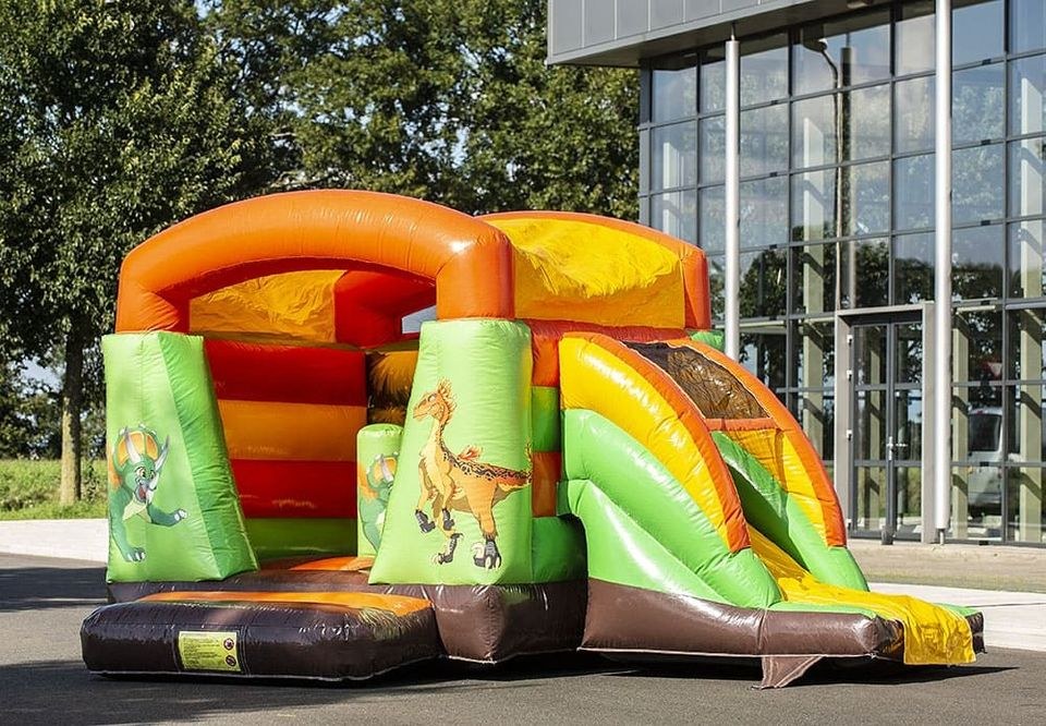 Hüpfburg Minidino Rutsche mieten bei Hopser Hüpfburg Verleih