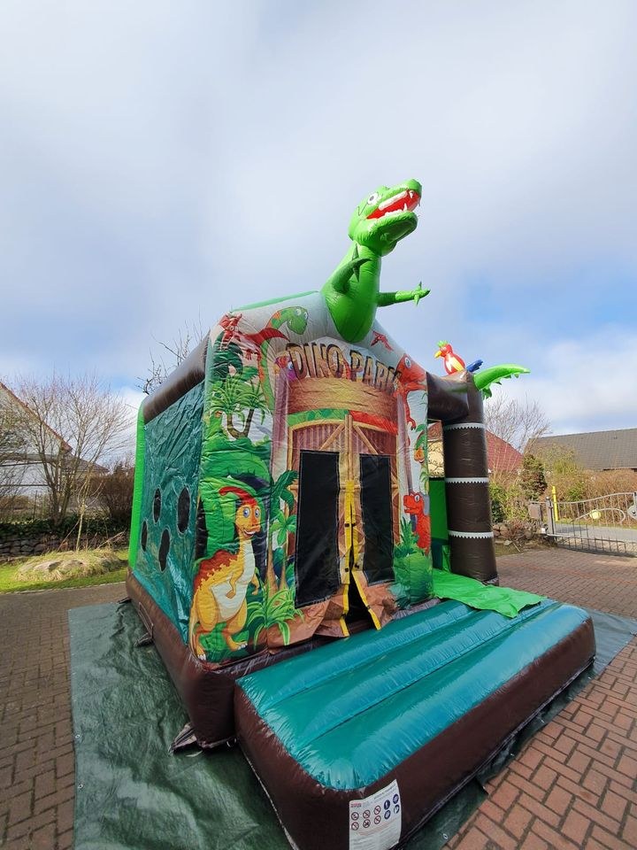 Hüpfburg Disco Dino Rutsche mieten bei Hopser Hüpfburg Verleih