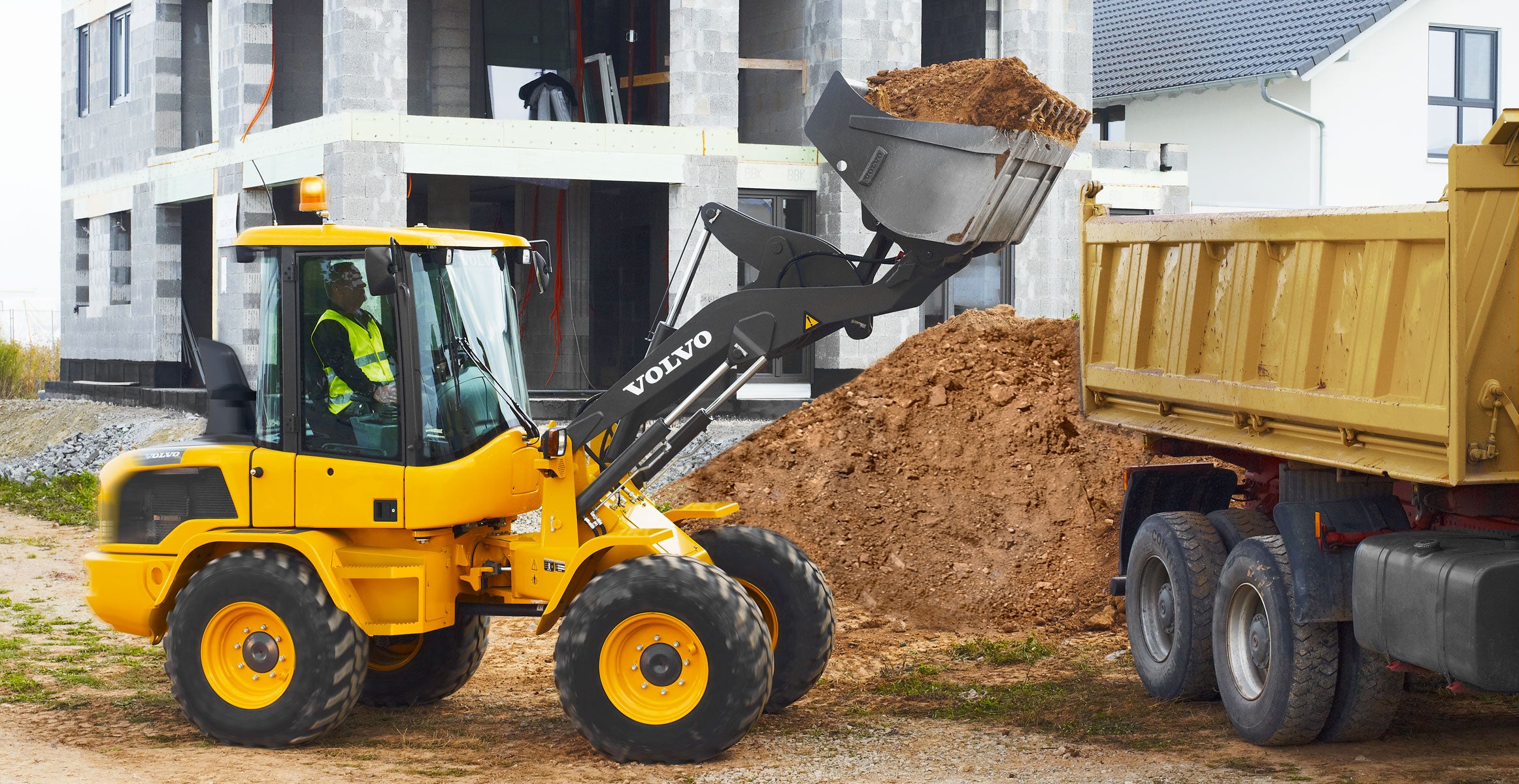 Radlader mieten 5,5t , 1m³ Schufelinhalt – 3