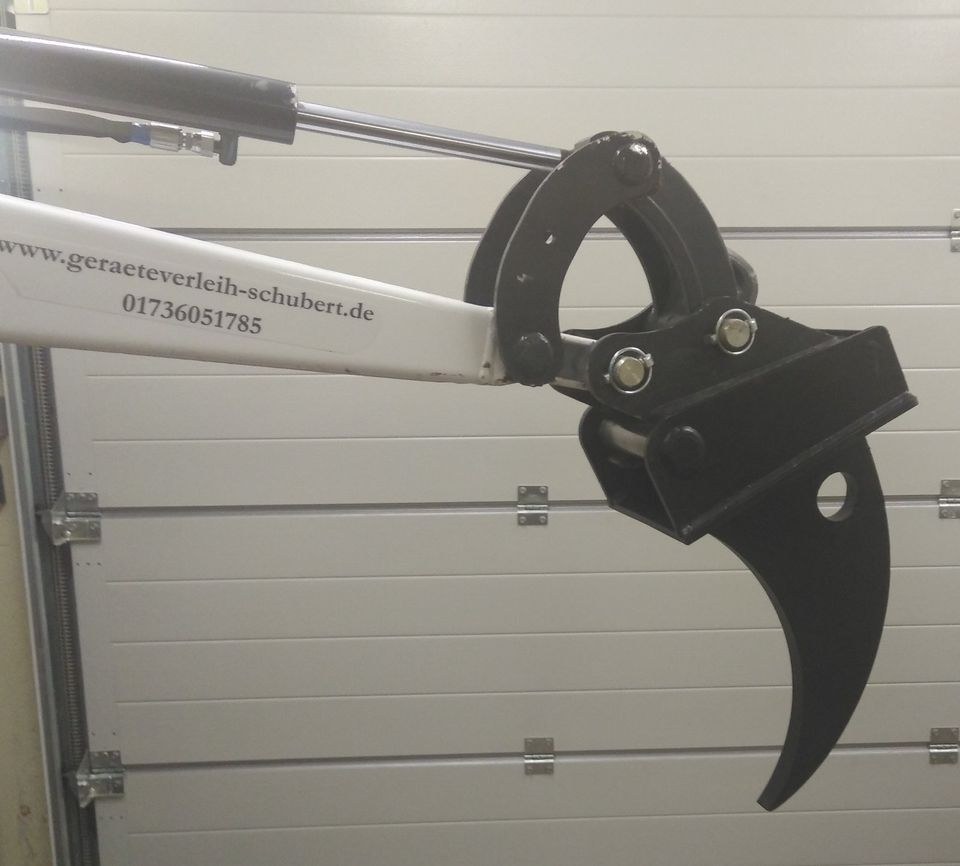 Bagger Wurzelhobel Reißzahn Baumstumpf mieten in Hungen
