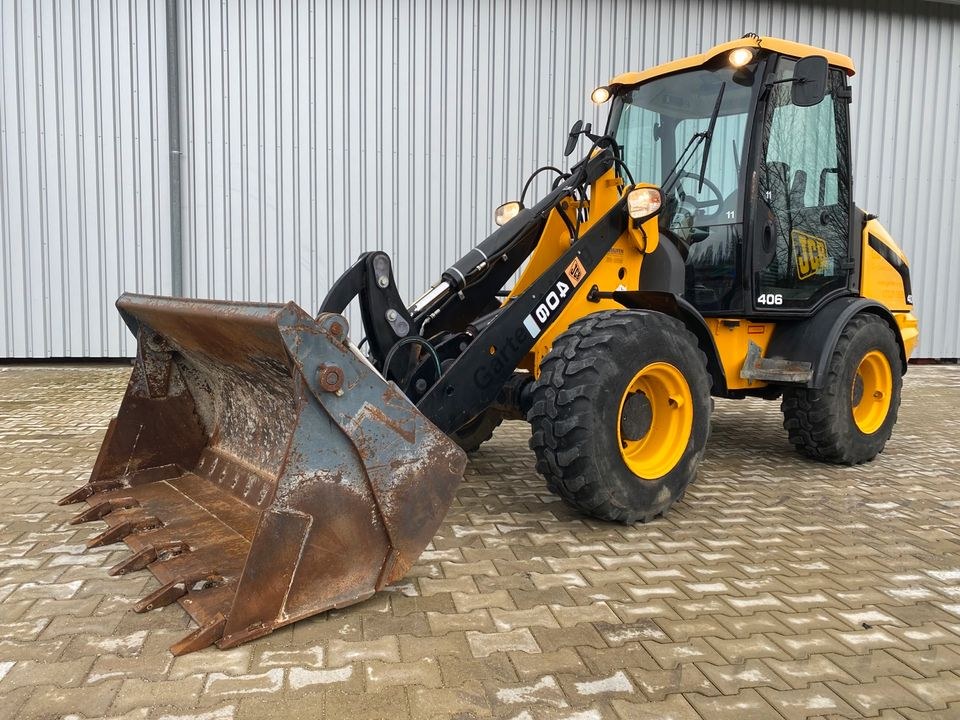Radlader JCB 406 Palettengabel Klappschaufel mieten bei menzinger – 2