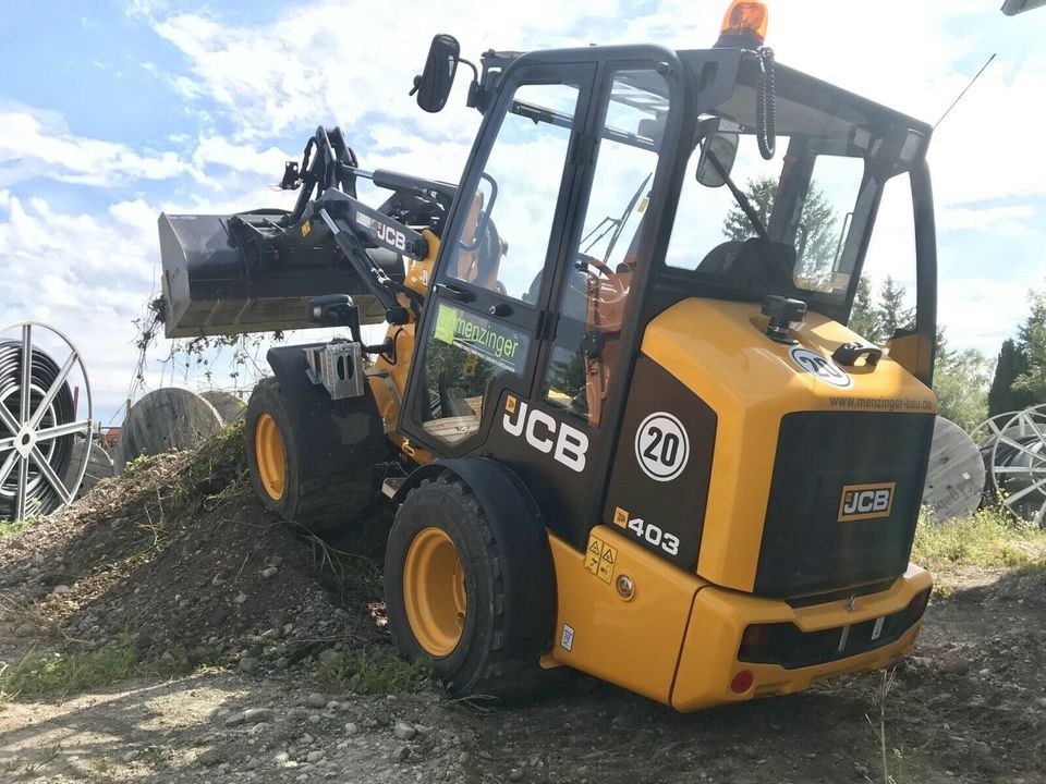 Radlader 2500kg kompakt Schaufel JCB 403 129 mieten bei menzinger – 4
