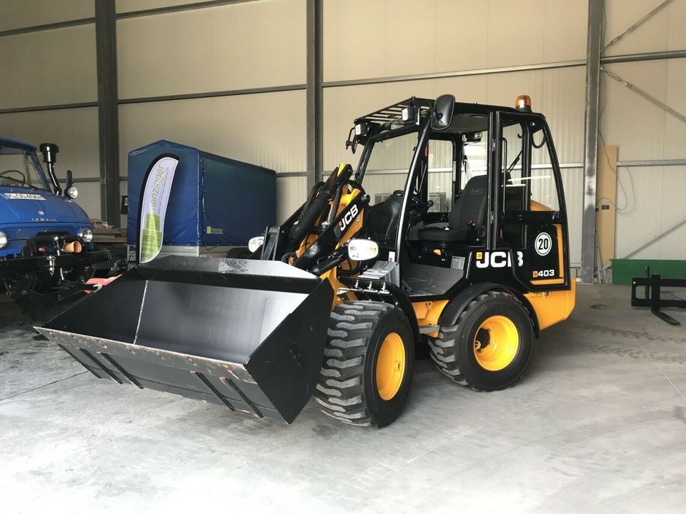 Radlader 2500kg kompakt Schaufel JCB 403 129 mieten bei menzinger – 3