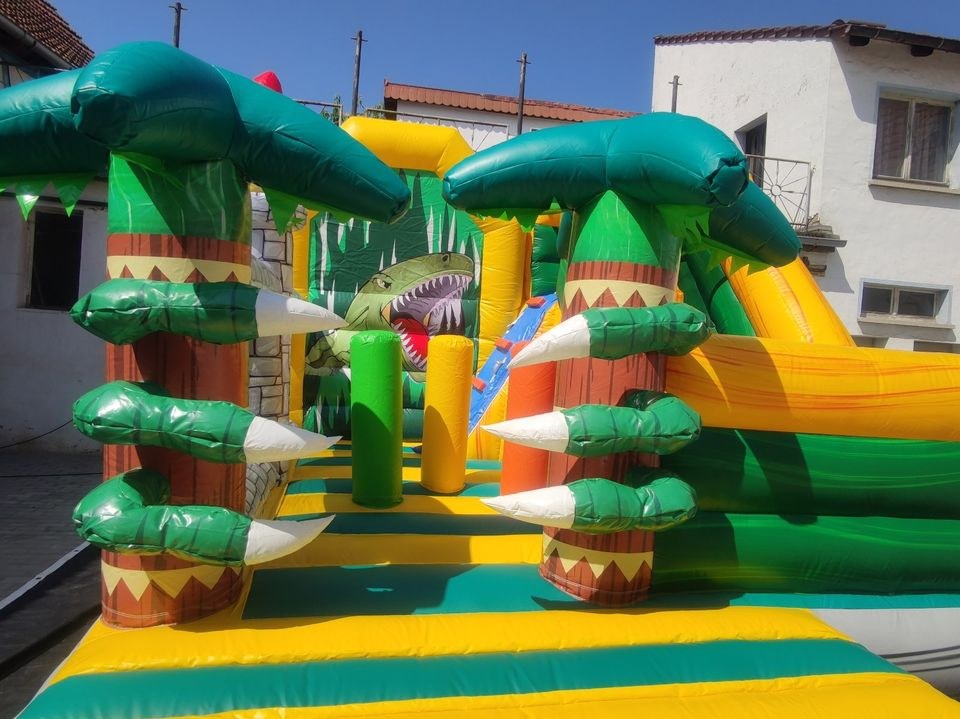 Hüpfburg Dino Rutsche Multiplay mieten bei Vermietung Flachsbarth