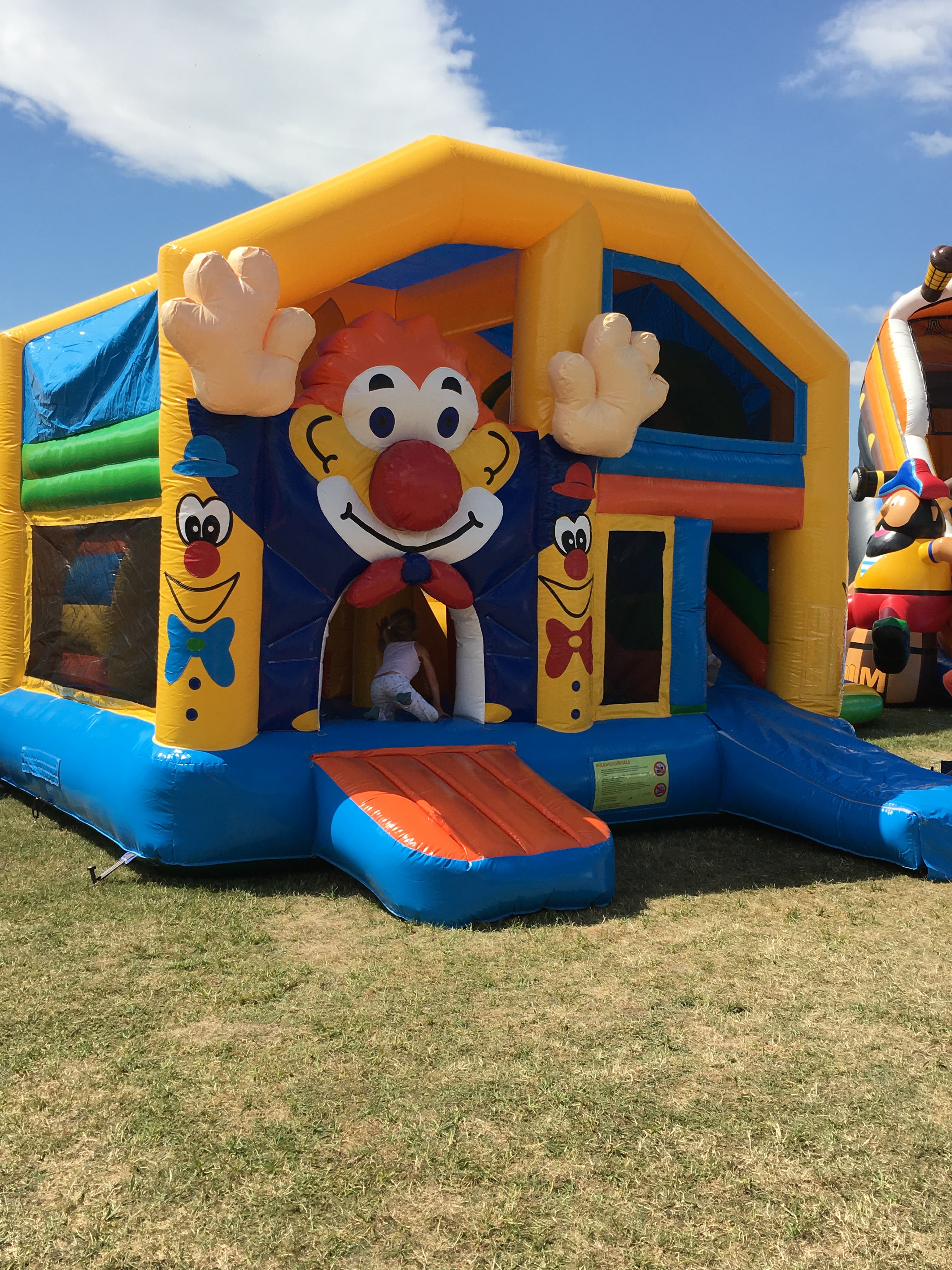 Hüpfburg "Clownrutsche mit Multiplay" 12,00 x 4,00 m – 4