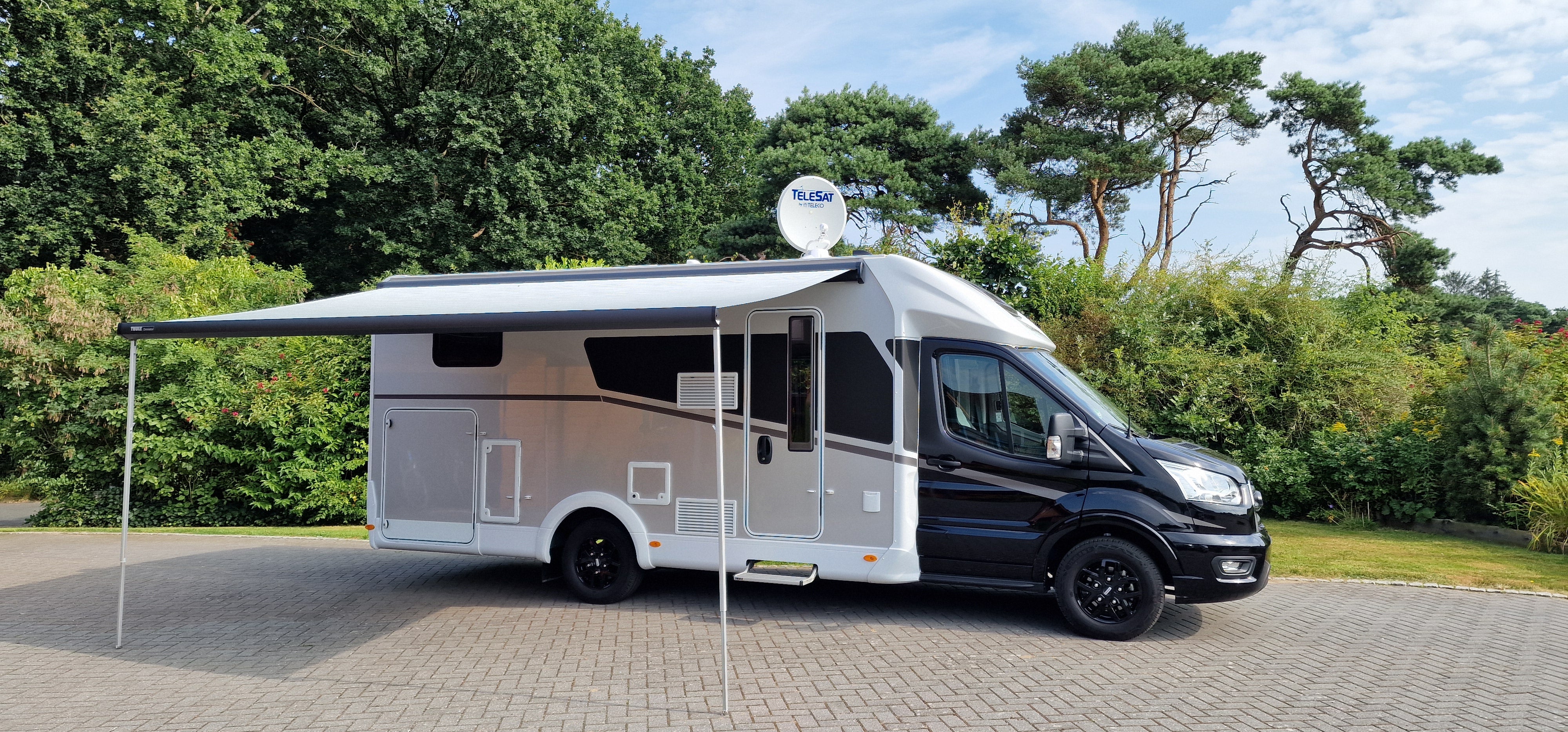 Wohnmobil Sunlight T 680 Automatik mit vollautomatischer Sat Anlage, Doppel Din Radio, Navi, Rückfahrkamera, Fahrradträger und Markise