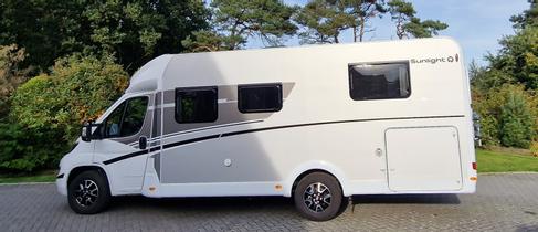 Wohnmobil Sunlight T 69 Active mit TV,Queensbett, Doppel Din Radio,Navi, Rückfahrkamera,4er Fahrradträger und Markise – 4