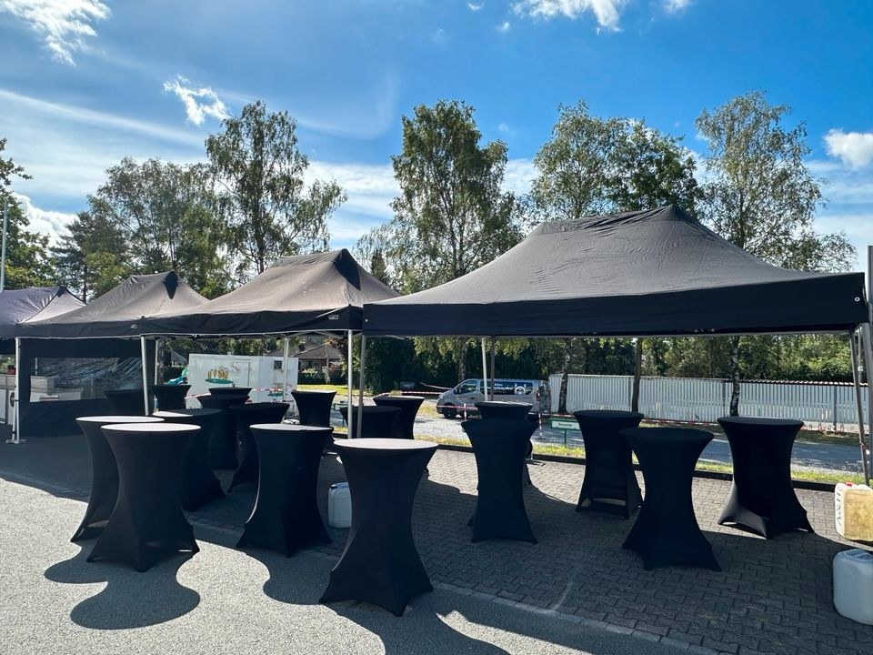 Stehtisch Holzplatte Hussen Rot Schwarz mieten in Oerlinghausen – 4