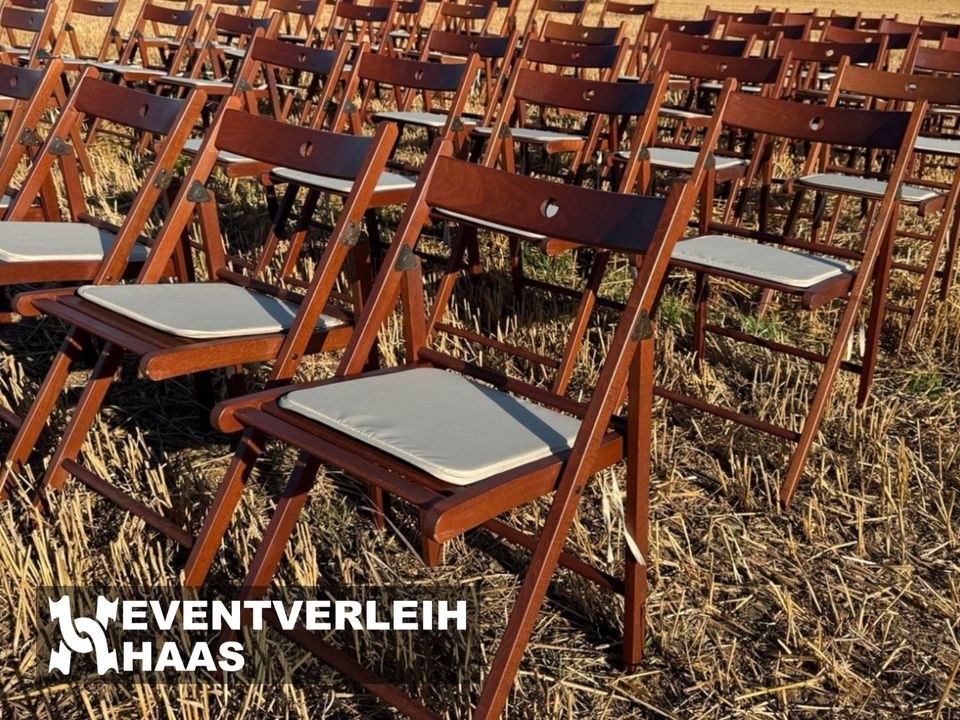 Holz Klappstühle inkl Sitzkissen Stühle mieten in Schleiden