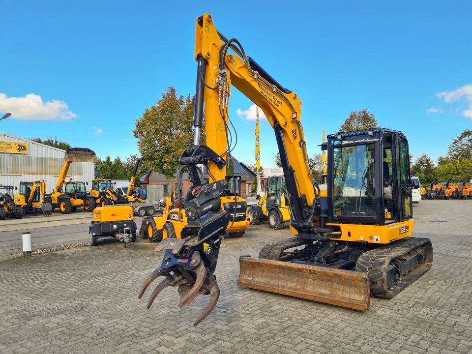 Minibagger 8,9 t Knickschere Fällgreifer u mieten in Bad Schwartau