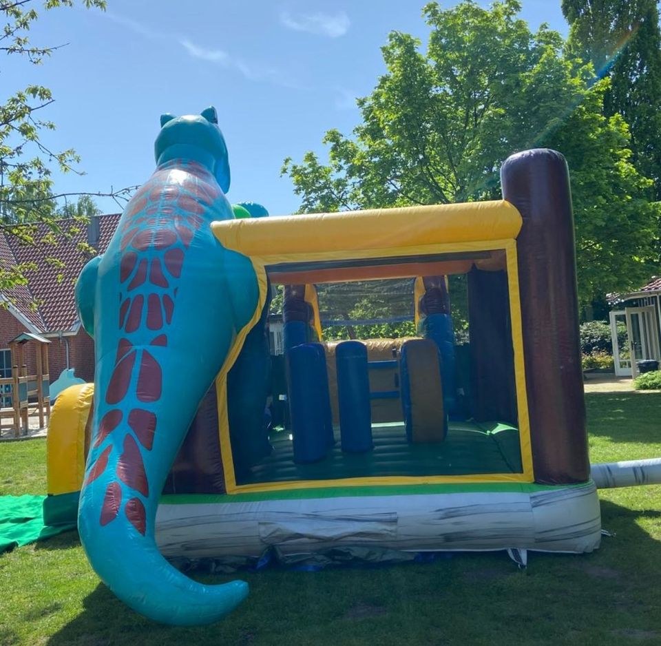 Riesige Dino Dinosaurier Hüpfburg Rutsche mieten bei Spielpunkt – 3