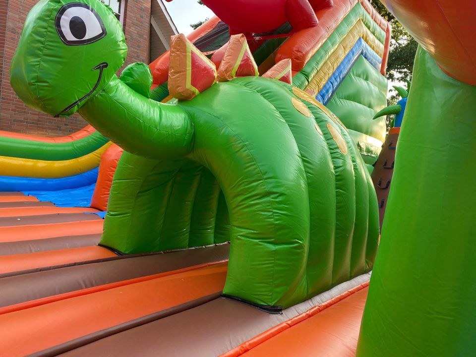 Riesen Dino Hüpfburg Rutsche 10m x 7m mieten bei Spielpunkt – 3