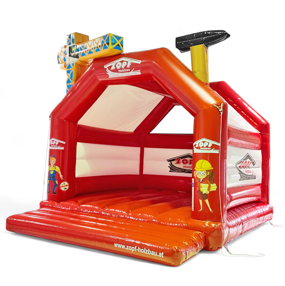 Hüpfburg mit 3D Elemente Kran und Hammer, personalisiert mit Logos mieten bei Happy Fun