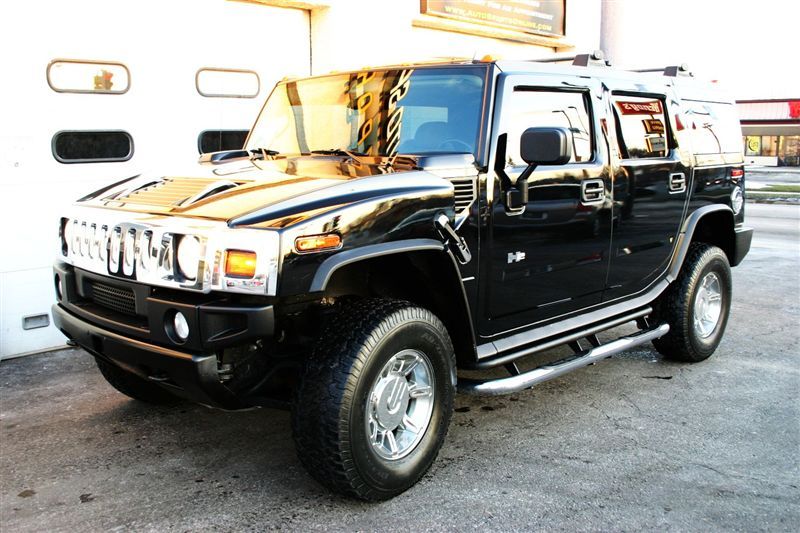 Hummer H2 in schwarz mit Chauffeur